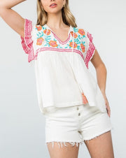 Embroidered Bib Tassel Tie Top